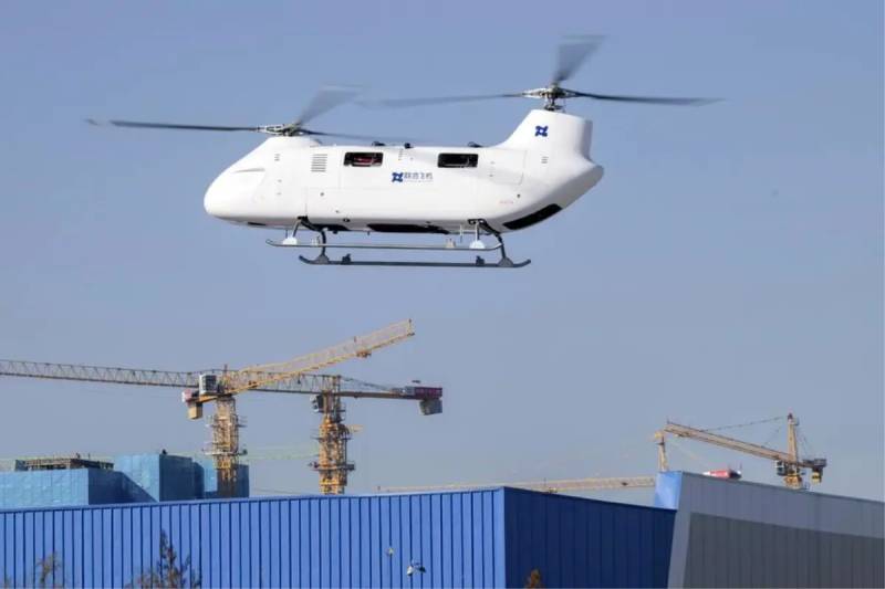 Çinin Ağır Yükgötürmə Qabiliyyətli T1400 Cüt Rotorlu Pilotsuz Helikopteri İlk Uçuşunu Uğurla Başa Vurub